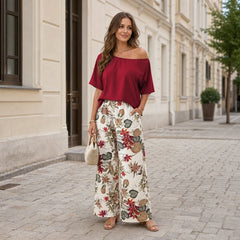 【La modă, mărimi mari】Set din 2 piese cu imprimeu (bluză cu umăr asimetric + pantaloni largi)